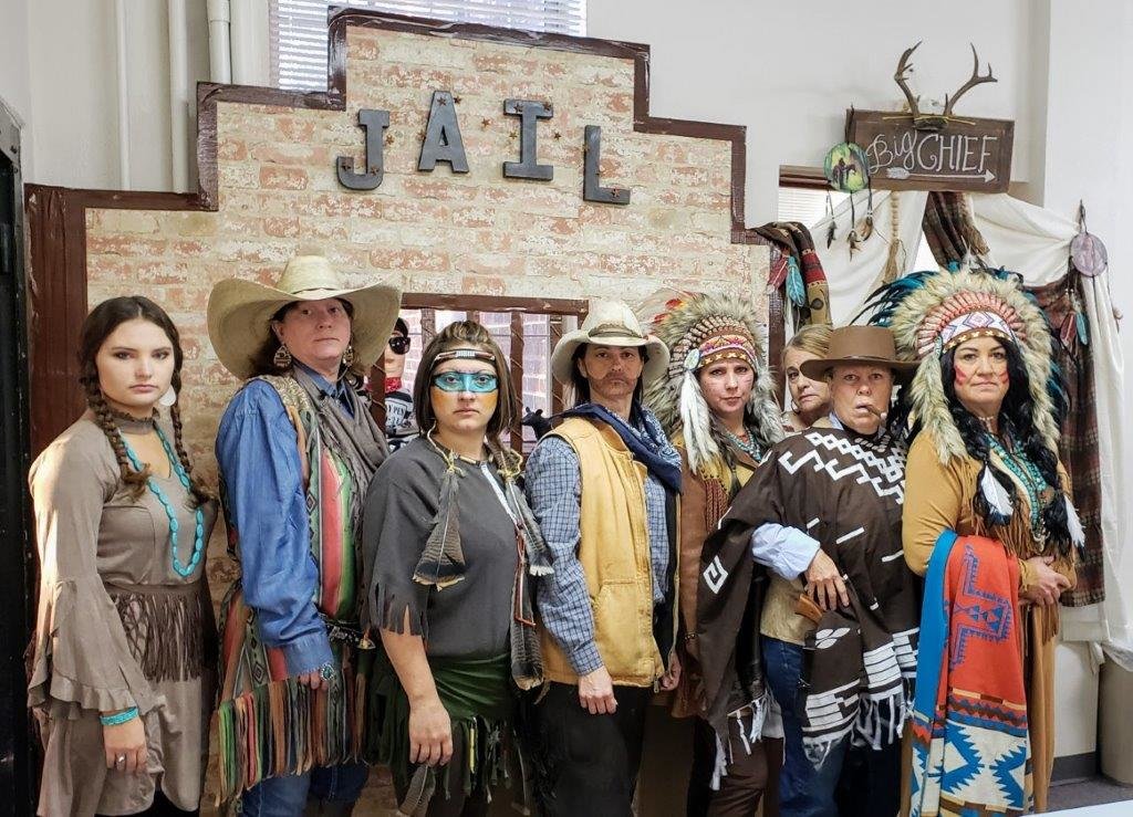 The ladies in the Wood County Clerk’s Office got into the spirit of Halloween bringing back an Old West theme to the courthouse Oct. 31. They are (from left) Taryn Hamilton, Patty Sinclair, Sonya Pyron, Dachelle Hag- gerty, Chirstan Robinson, Vicky Red- ding, Shirley Burns and Kelley Price.